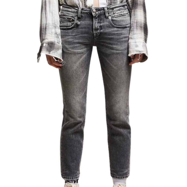 A pair of low-rise dark grey/black wash straight jeans is displayed against a white background. The image showcases the jeans from the waist to the ankles. The jeans have a dark grey or black wash, offering a stylish and sleek appearance.