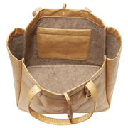 Image: An interior view of a tan cotton felt tote bag, revealing its functional design. The bag includes an interior pocket for organizing essentials. The soft cotton felt material adds a cozy and tactile element to the bag. Its versatile tan color makes it a stylish accessory for various occasions."