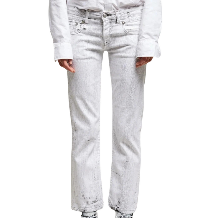 A pair of low-rise straight leg jeans is displayed against a white background. The jeans have a white base wash and showcase vertical cracks that have appeared, giving them a distressed appearance.