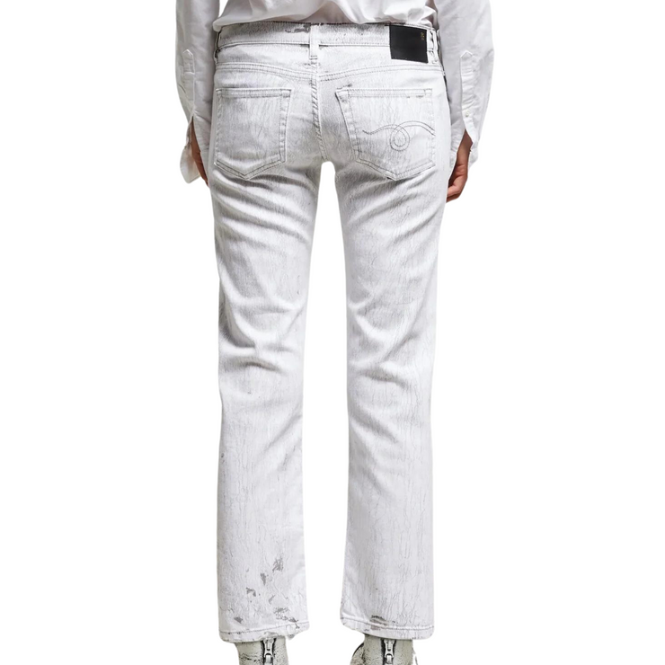The back view of a pair of low-rise straight leg jeans is shown against a white background. The jeans feature a white base wash with prominent vertical cracks, giving them a distressed appearance.